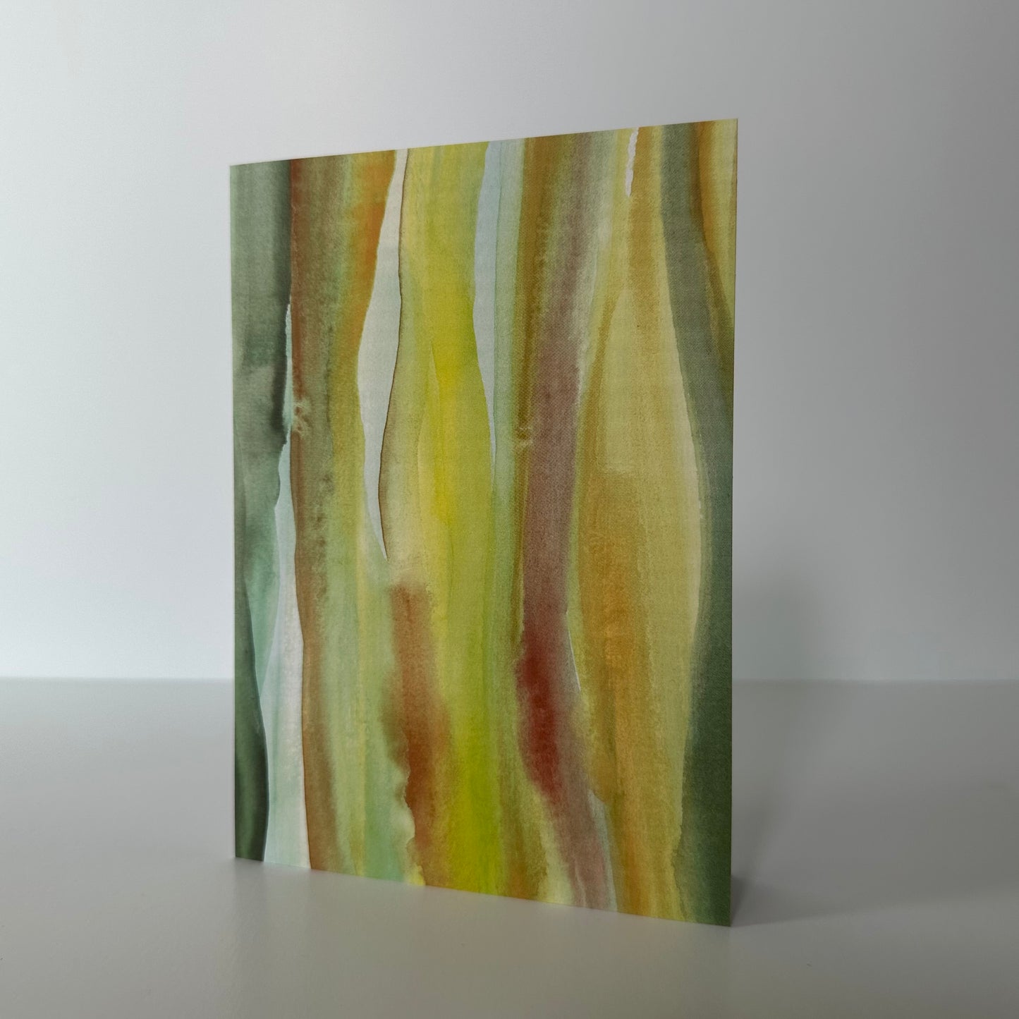 Abstract art piece with wavy color patterns on a white background